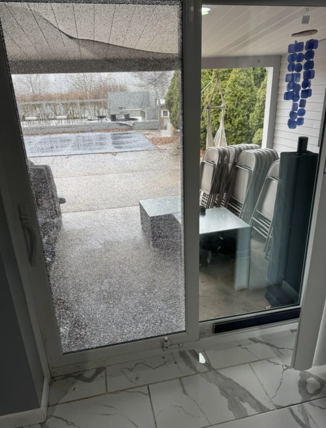 Shattered tempered sliding glass door panel needing replacement in South Florida